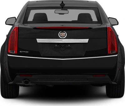 Rear view with vertical tail lights and trunk design.