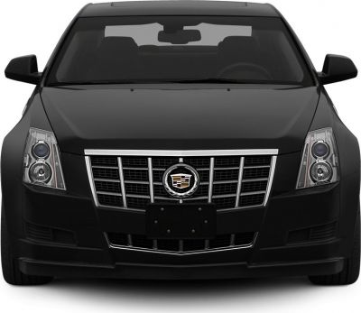 Distinctive front grille with Cadillac emblem and dual round headlights.