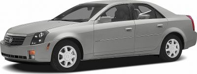 Sleek side profile of a four-door luxury sedan with smooth bodylines.