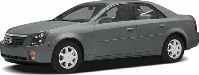 Side profile of a 2003 sedan with distinct angular design.