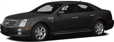 Front side view of a sedan with sleek body lines and distinctive grille.