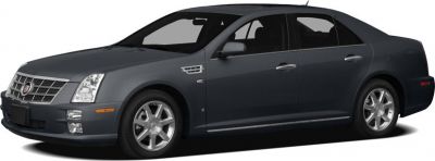 Luxury sedan with chrome grille, multi-spoke wheels, and smooth four-door profile
