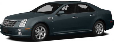 Dark blue luxury sedan with chrome grille and alloy wheels side view