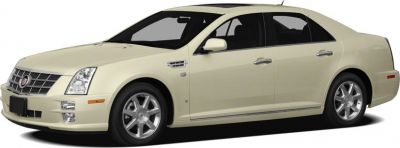 Clean-lined luxury sedan front-side view with distinctive headlights and smooth body.