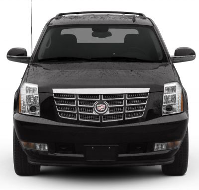 SUV front view with chrome grille and rectangular headlights.