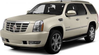 Front-side view of a luxury SUV with chrome wheels and distinctive grille