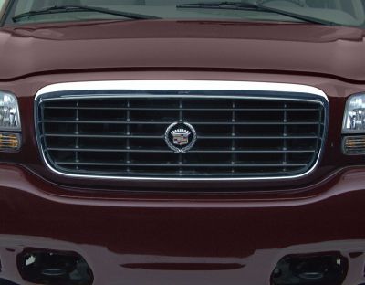 Classic luxury SUV front grille with emblem and dual headlights