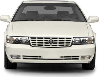 Front view of a luxury sedan with distinctive grille and headlight design