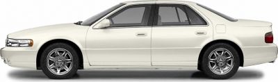 Sleek side profile of a four-door sedan with alloy wheels