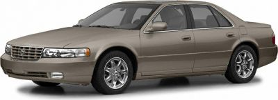 Chrome grille and alloy wheels on a classic four-door sedan.