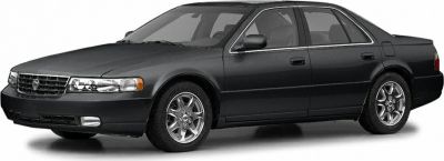 Black luxury sedan with chrome wheels and classic grille design