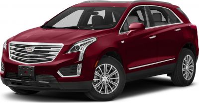 Front grille and LED headlight close-up on red luxury SUV