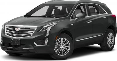 Luxury SUV front view with L-shaped LED headlights and wide chrome grille