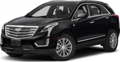 Front-side view of a luxury SUV with LED headlights and alloy wheels