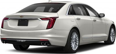 Sleek rear design with vertical tail lights and quad exhaust pipes