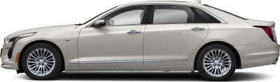 Side profile of luxury sedan with multi-spoke alloy wheels and chrome trim.