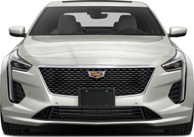 Luxury sedan front view with distinctive grille and LED headlights
