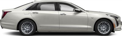 Luxury sedan side profile with multi-spoke alloy wheels and sleek design