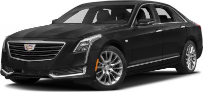Luxury black sedan with vertical LED headlights and chrome grille