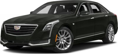 Luxury sedan front view with LED headlights and alloy wheels
