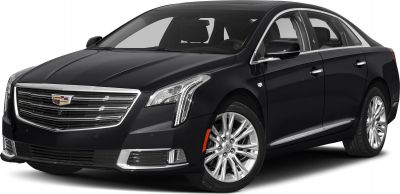 Luxury sedan with LED headlights and prominent chrome grille