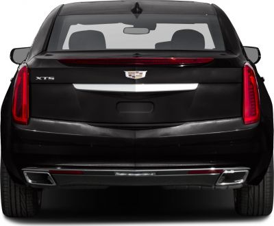 Rear view showcasing vertical LED taillights and chrome accents