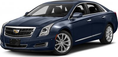 Luxury sedan front-side view with LED headlights and alloy wheels