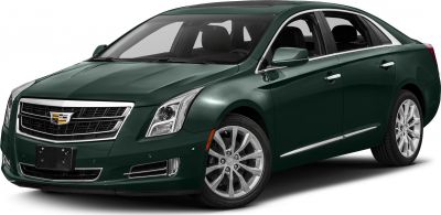 Luxury sedan front three-quarter with chrome grille and sleek headlights