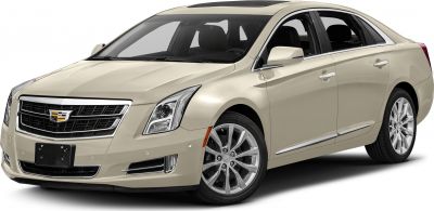 Front-side view of luxury sedan with signature grille and sleek headlights