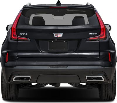 Facelift rear view with updated vertical taillights and dual exhausts.