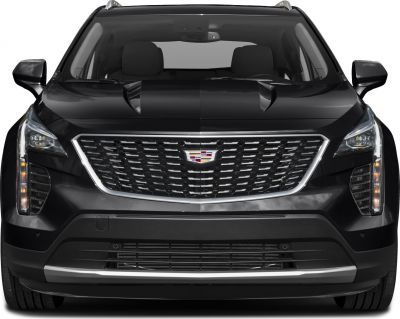 Front view featuring bold grille and vertical LED headlights