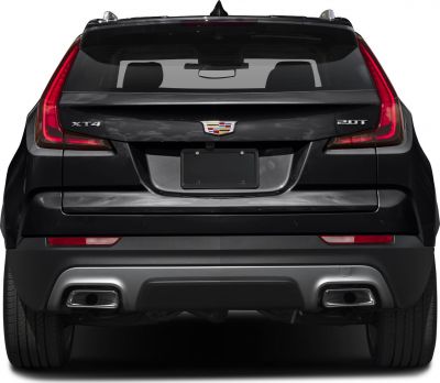 Rear with unique tail lights and dual chrome exhaust outlets