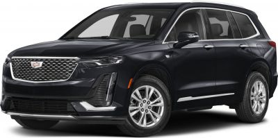 Front side view of a luxury SUV with distinctive grille and sleek design