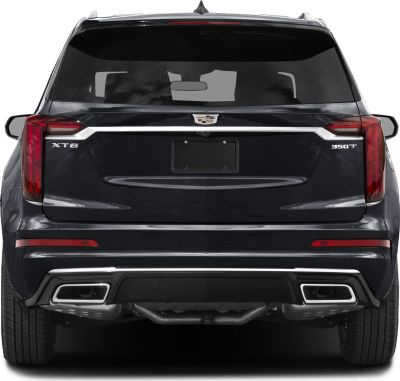 Rear view with vertical tail lights and dual rectangular exhaust outlets