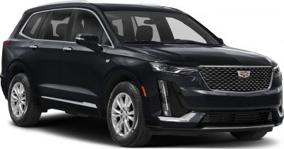 Front side of an SUV showcasing headlights and grille design