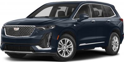 SUV front grille and side profile with multi-spoke wheels and chrome accents