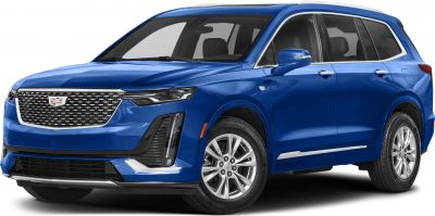 Blue SUV showcasing front three-quarter view with distinctive grille and headlights
