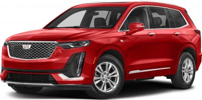 Red SUV with distinctive grille and sleek headlights