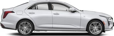 Sleek sedan side profile with multi-spoke alloy wheels