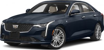 Sleek sedan with vertical LED headlights and multi-spoke alloy wheels.