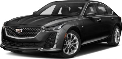 Front profile of a luxury sedan with grille and alloy wheels