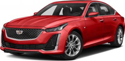 Front view with distinctive grille, headlights, and alloy wheels