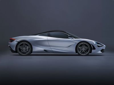 Sleek aerodynamic side profile with modern alloy wheels