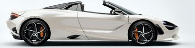 Convertible sports car with aerodynamic lines and performance wheels