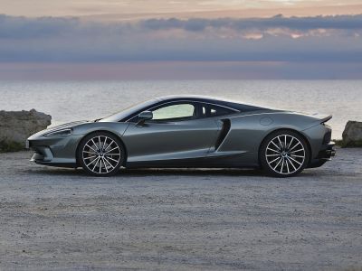 Aerodynamic side profile with alloy wheels on luxury sports coupe