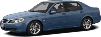 Side profile of a blue sedan with alloy wheels and sleek design.