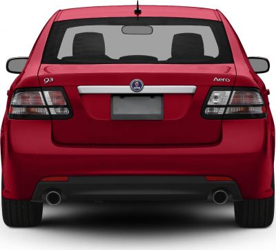 Rear view of a red sedan with dual exhausts and distinct tail lights