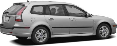 Side profile of a silver station wagon with alloy wheels and distinct tail lights