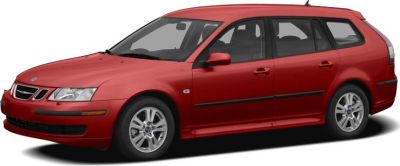 Red station wagon front side view with alloy wheels
