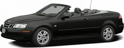 Black two-door convertible with roof down and alloy wheels.